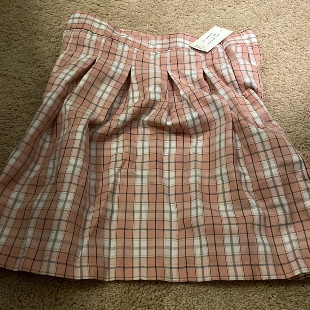 Pink,black and white skirt